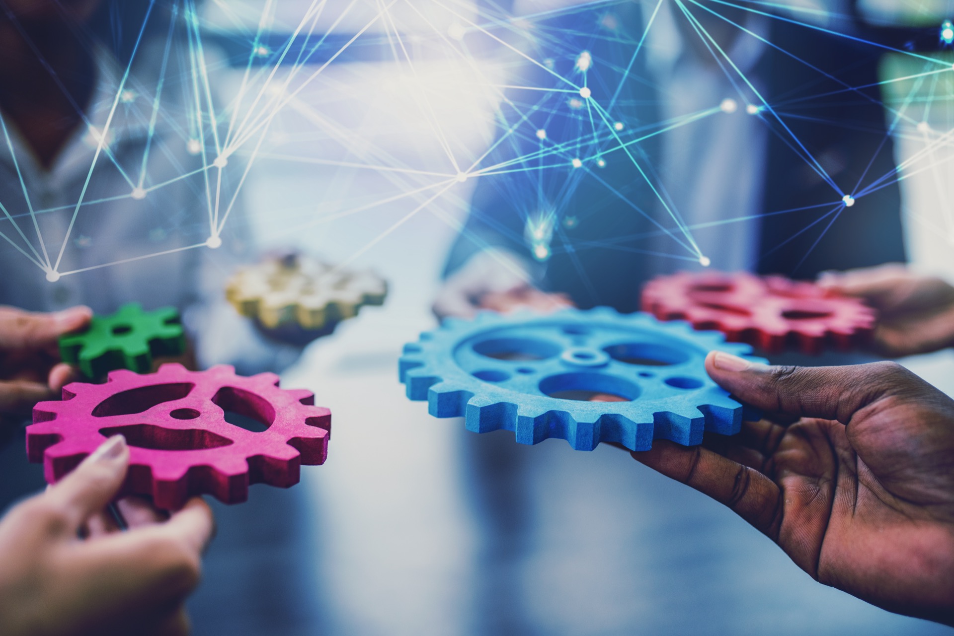 Partners connecting cogwheels